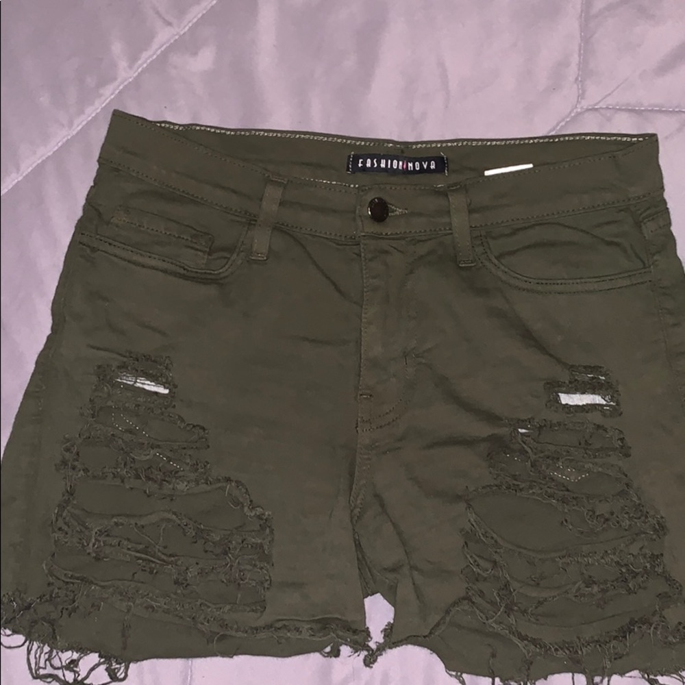 Distressed army green shorts